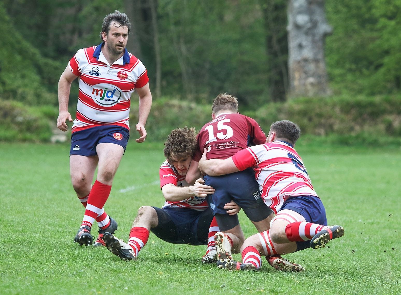 Panmure's number 15 is tackled by Euan Willetts and Neil Alexander, with David Clarke in the background. Picture: John MacGregor