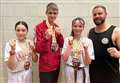 Sansum Martial Arts trio win medals at International Kickboxing Open