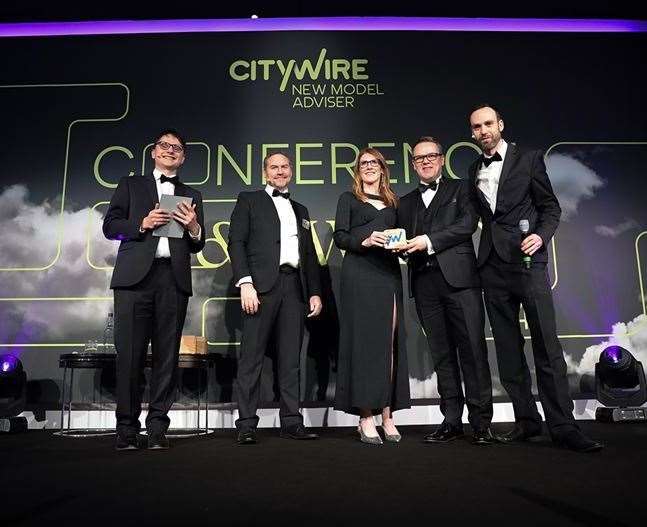 The team collecting the award in London.