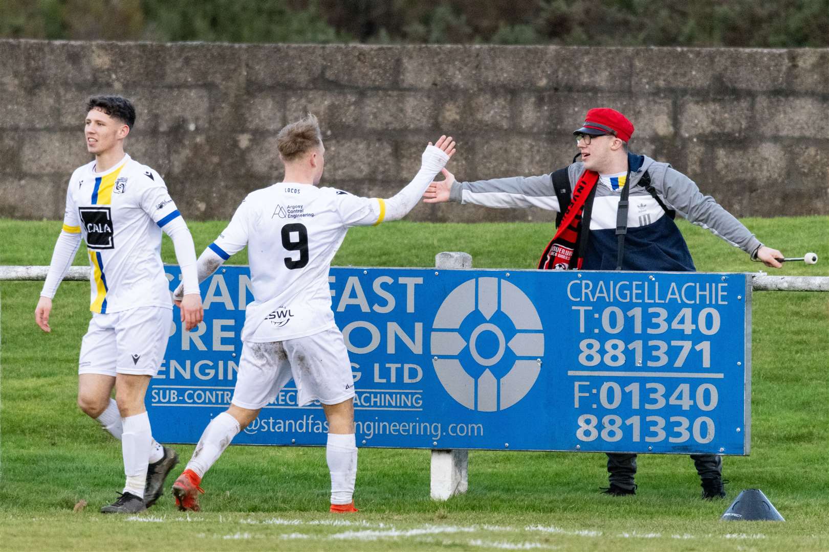 Inverurie's Nathan Meres celebrates with a fan. ..Rothes F.C. (1) v Inverurie Locos F.C. (4) at Mackessack Park, Rothes. ..Piture: Beth Taylor.