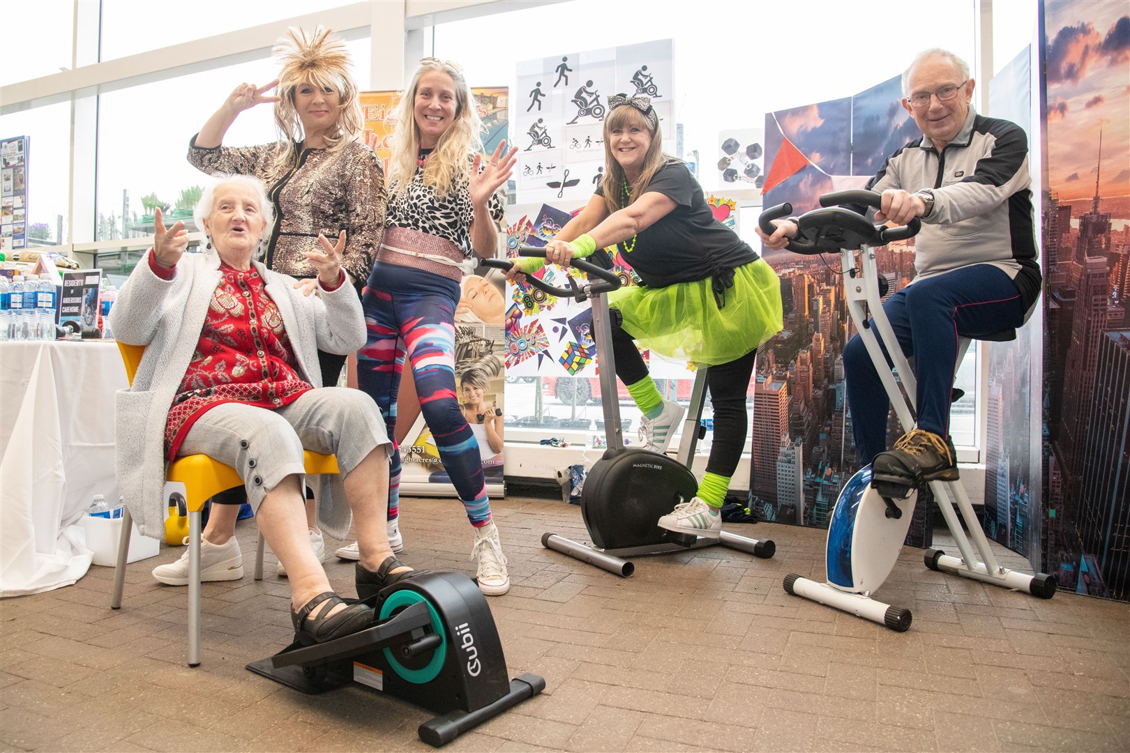 From left: resident Sara Beggs, staff members Joan Cowe and Sarah Granitza, TESCO staff member Tracy Gourley and Anderson's Chairman Iain Jamieson joined together at Tesco for an 80's fundraiser. Picture: Daniel Forsyth